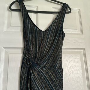 Beautiful sparkled Guess by Marciano dress with form fitting knot in front.